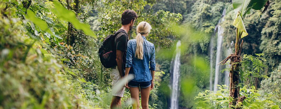 Couple-Exercising-on-Vacation-with-a-Tropical-Hike
