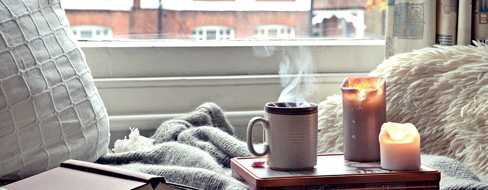 Cozy-Setting-with-Book-and-Candles-for-Spa-Day-at-Home