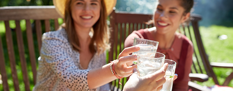 Friends-Enjoying-Staying-Hydrated-Outside