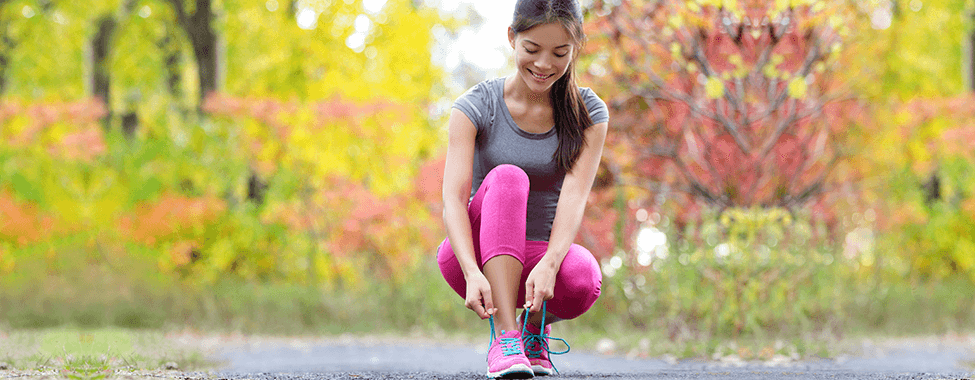 Girl-Lacing-Up-Shoes-to-Run-in-Spring