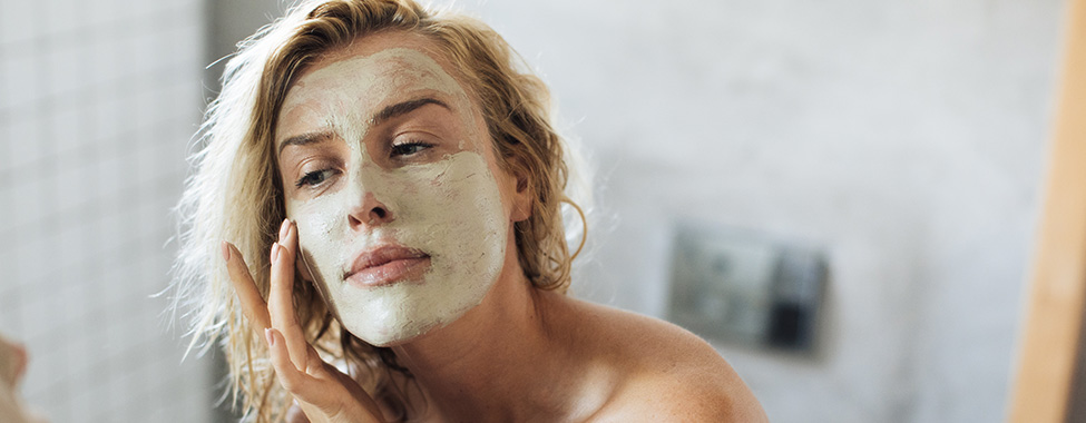 Woman-Applying-Face-Mask-for-Skin-Care-Routine