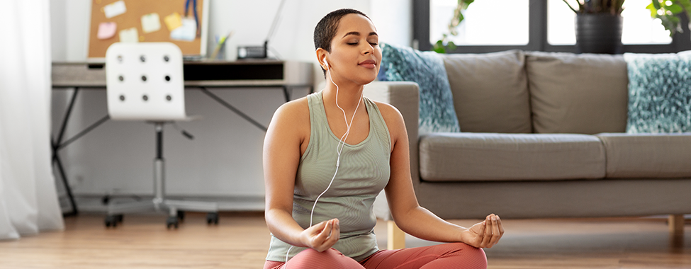 Woman-Doing-Yoga-and-Meditation-at-Home