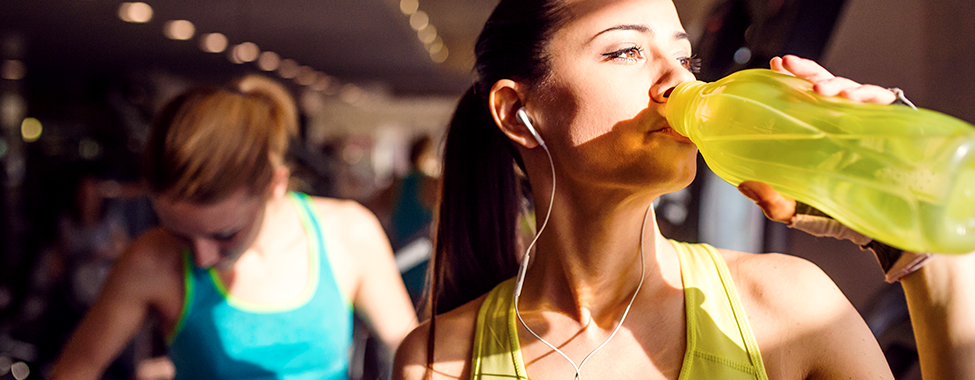 Woman-Hydrating-after-Sweating-at-Gym