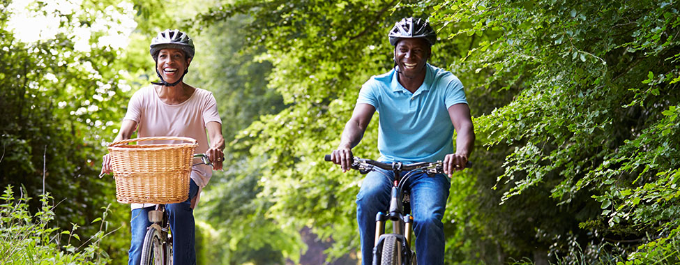 Couple Riding Bikes and Exercising Outdoors